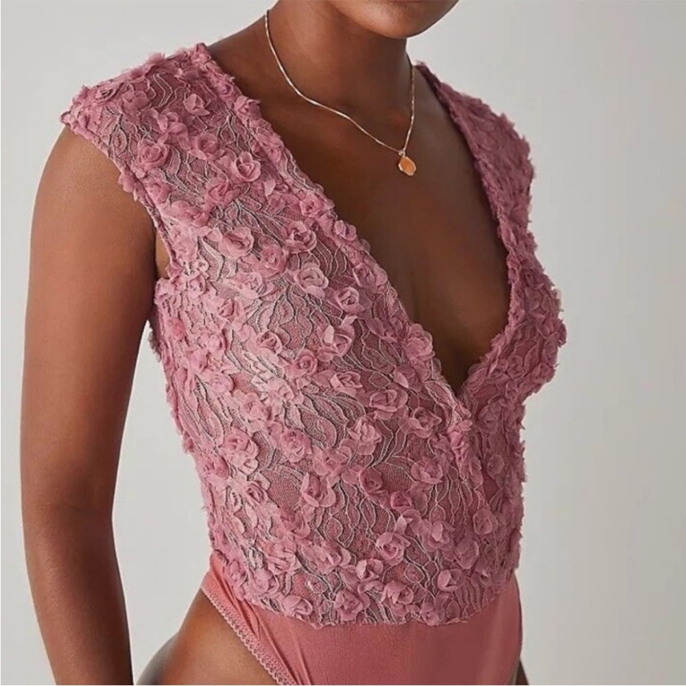 Free people Floral bodysuit.
